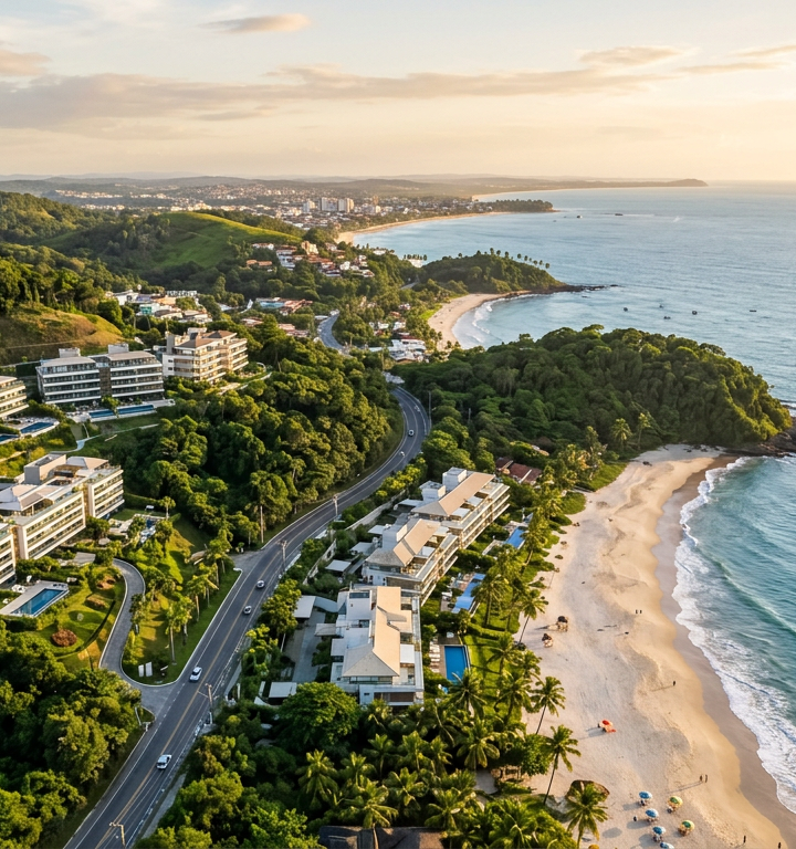 Vista aérea da costa de Ilhéus destacando a integração entre natureza e novos empreendimentos imobiliários.